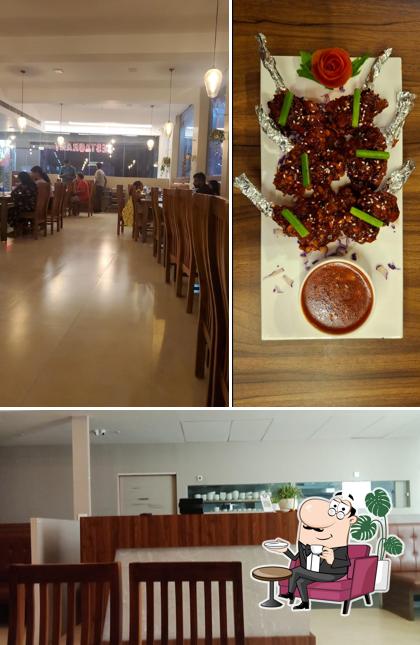 Take a seat at one of the tables at Coconut Palm