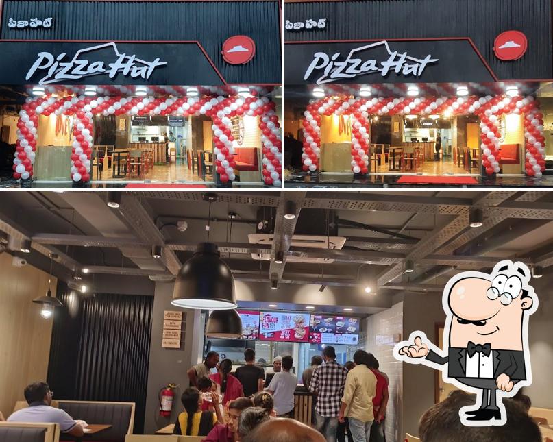 Check out how Pizza Hut Clock Tower Road, Nalgonda looks inside