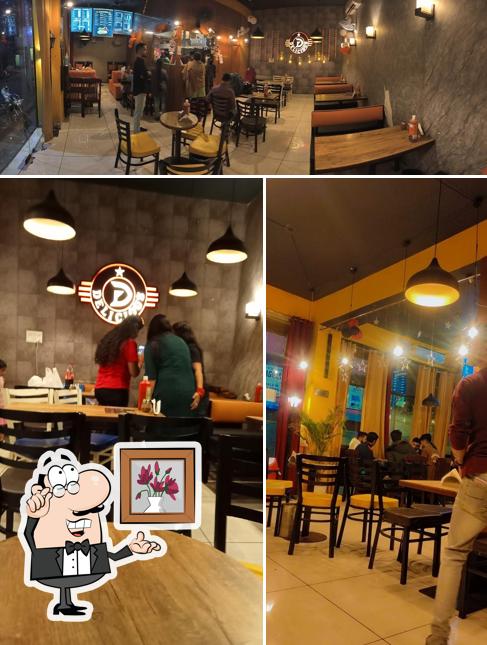 Take a seat at one of the tables at D'delicious
