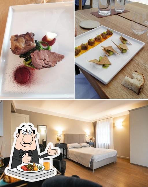 Questa è la foto che presenta la cibo e interni di Ristorante Fre - Réva Resort