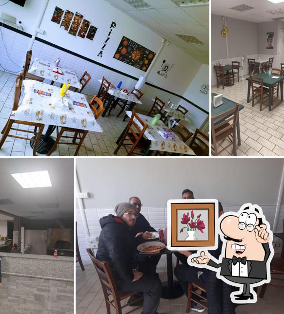 Dai un'occhiata agli interni di Pizzeria la Vecchia Napoli