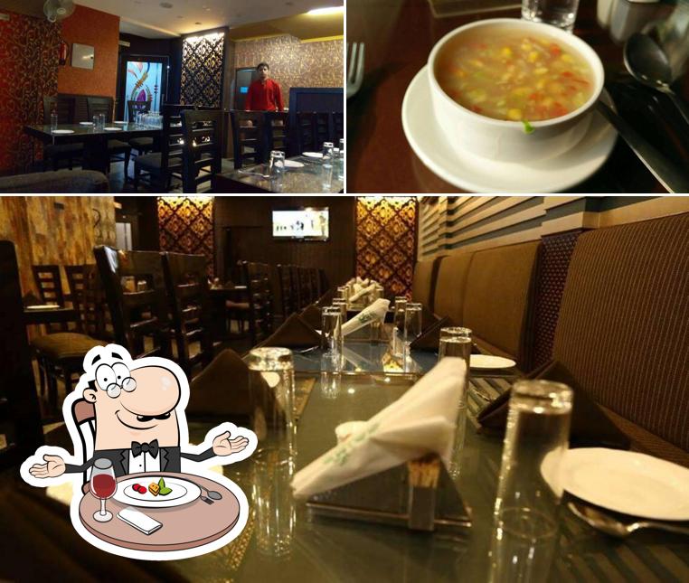 Adora Cafe & Dine is distinguished by dining table and food