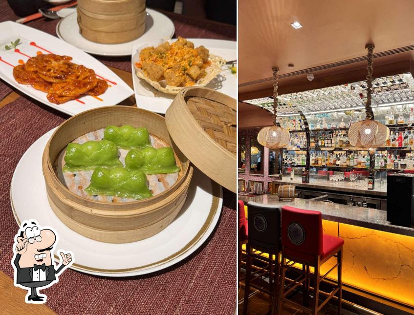 Take a seat at one of the tables at Yi Jing - ITC Maratha