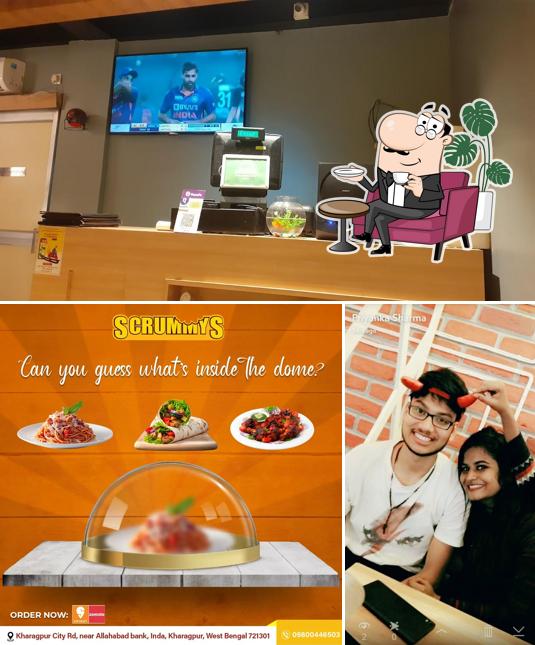 Take a seat at one of the tables at Scrummys Kharagpur