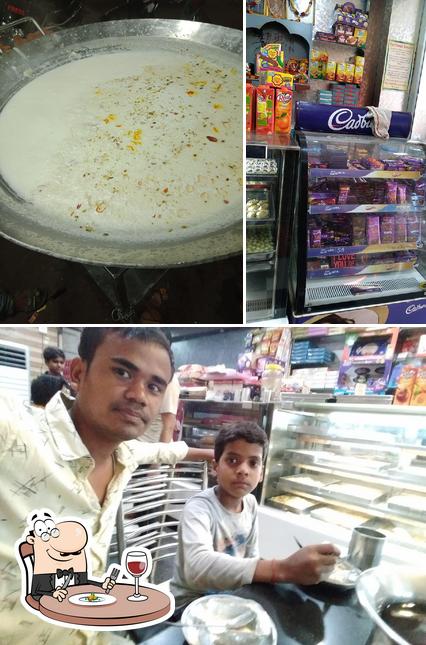 This is the photo displaying food and interior at Raj Shree Sweets