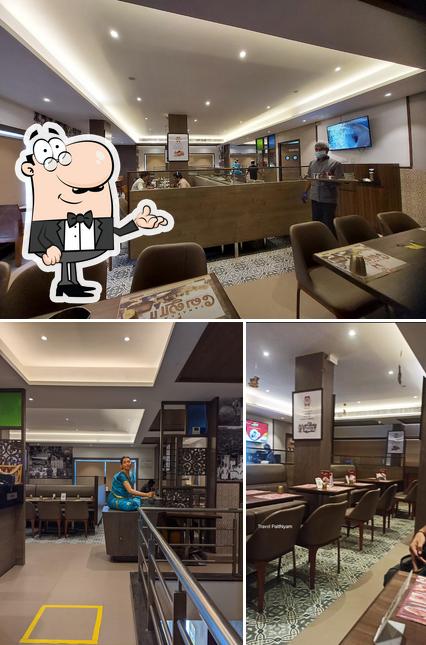 The interior of Dindigul Thalappakatti Restaurant