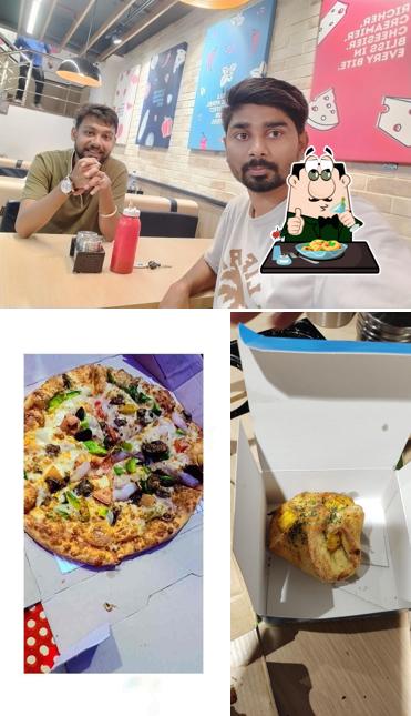 Domino's Pizza Narayanpura, Chhatarpur is distinguished by food and beverage Domino's Pizza Narayanpura, Chhatarpur is distinguished by food and beverage
