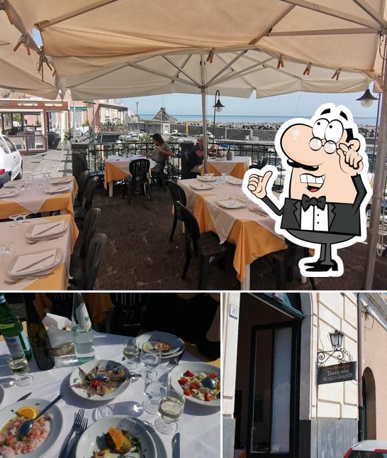 Siediti a un tavolo di Trattoria Scalo Grande
