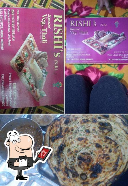 Among different things one can find exterior and pizza at Rishi Vegetarian Dhaba N.K