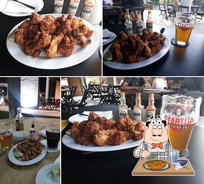 Asas de frango em Cervejaria Marcos Brunholi