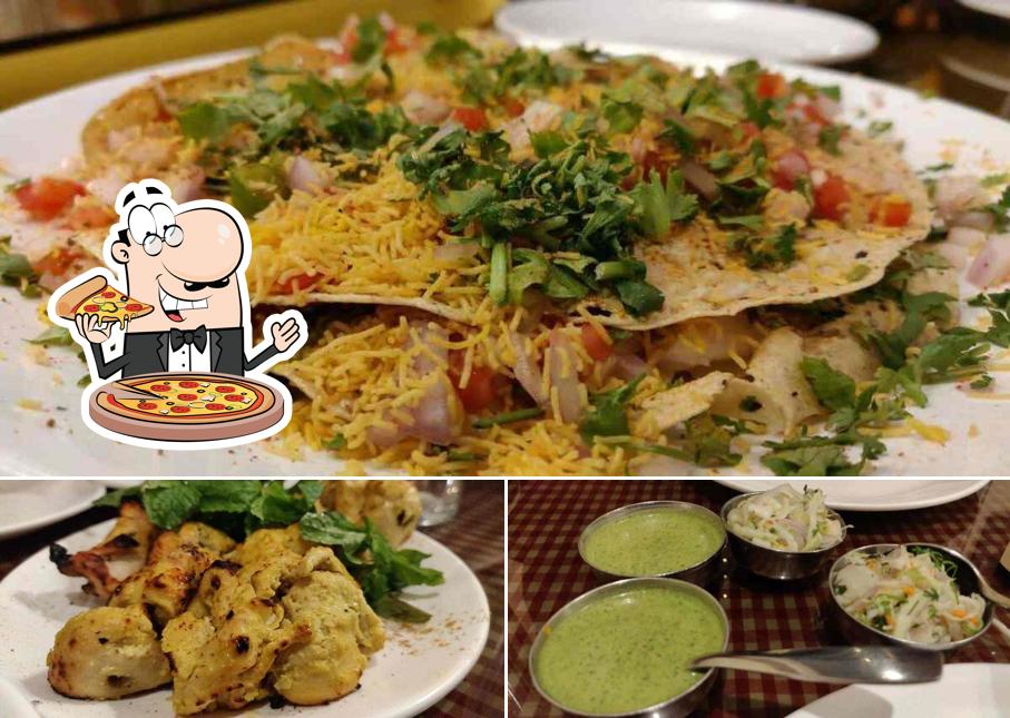 Pick pizza at Blue Nile Restaurant