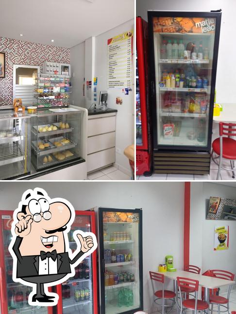 O interior do Lanchonete Ponto X