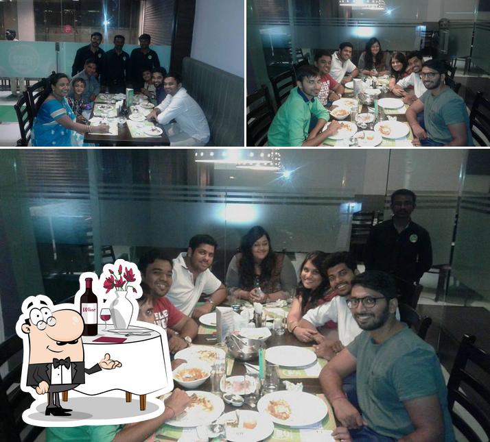 This is the picture depicting dining table and interior at GNG