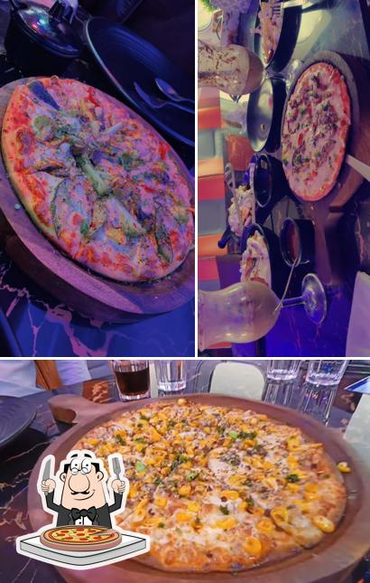 Try out pizza at Aero Restro