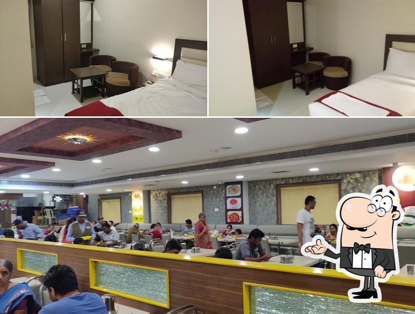 Take a seat at one of the tables at Samy Hotel