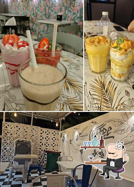 Take a seat at one of the tables at The Kaffee Nation