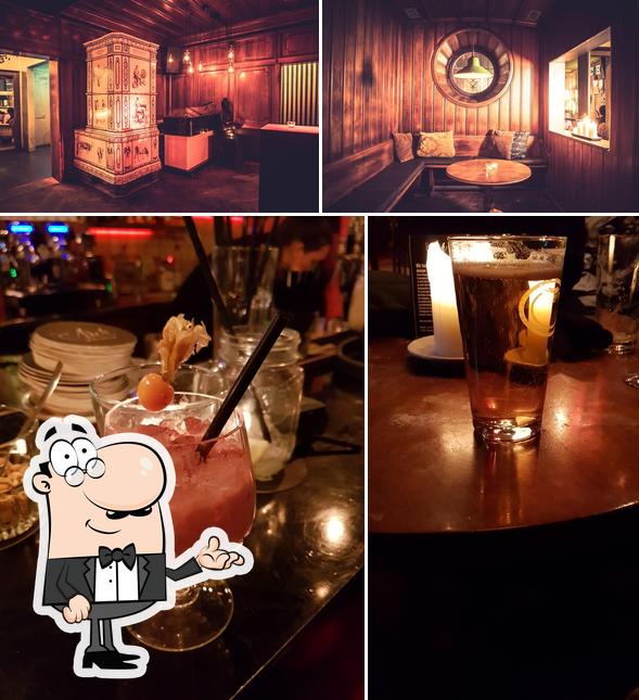 Questa è la immagine che raffigura la interni e bevanda di Arch Bar