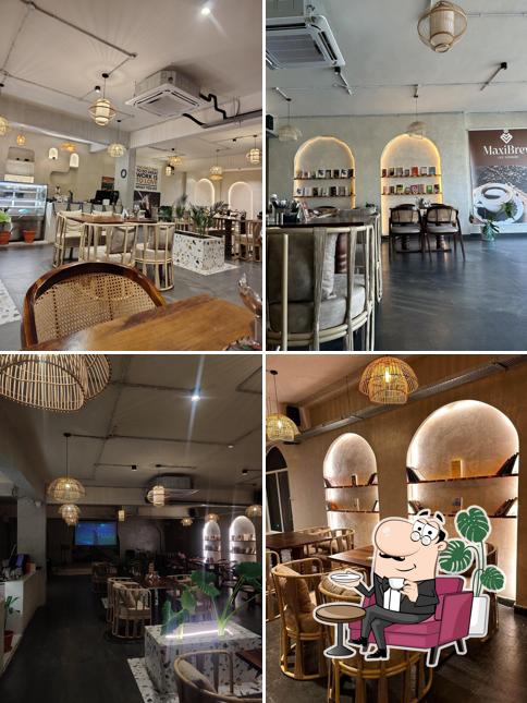 Take a seat at one of the tables at CAFE MAXIBREW