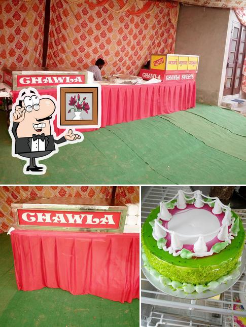 Among various things one can find interior and cake at Chawla Sweet House