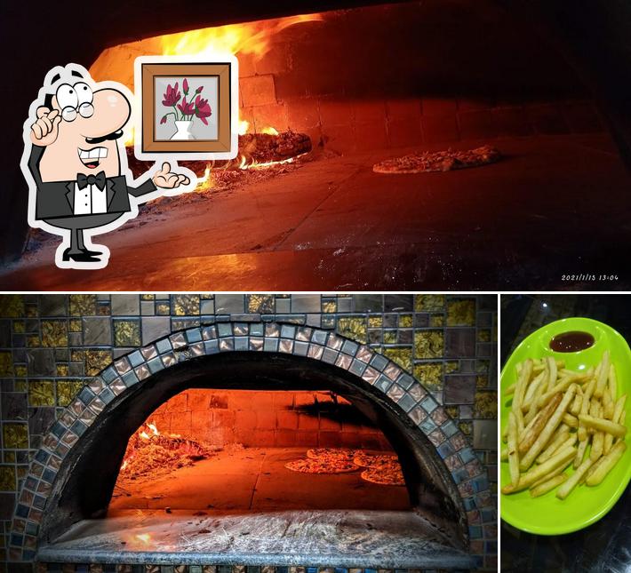 Check out the picture showing interior and fries at Dream PIZZA