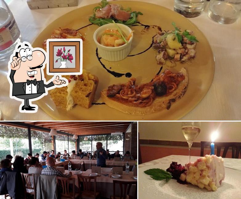La foto della interni e tavolo da pranzo di Ristorante il Pinzale