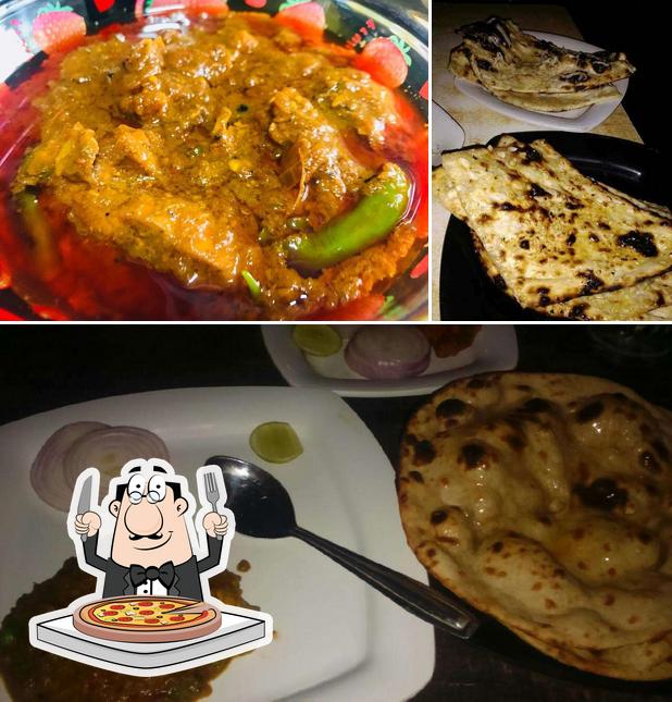 Get pizza at Sunny Restaurant & Bar
