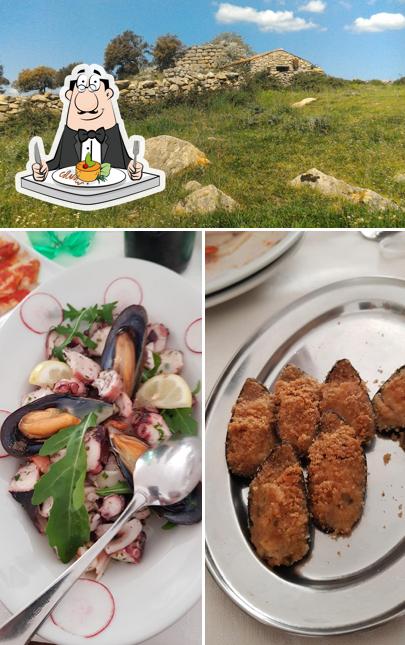 Guarda la immagine che mostra la cibo e esterno di Ristorante S'Iscopalzu