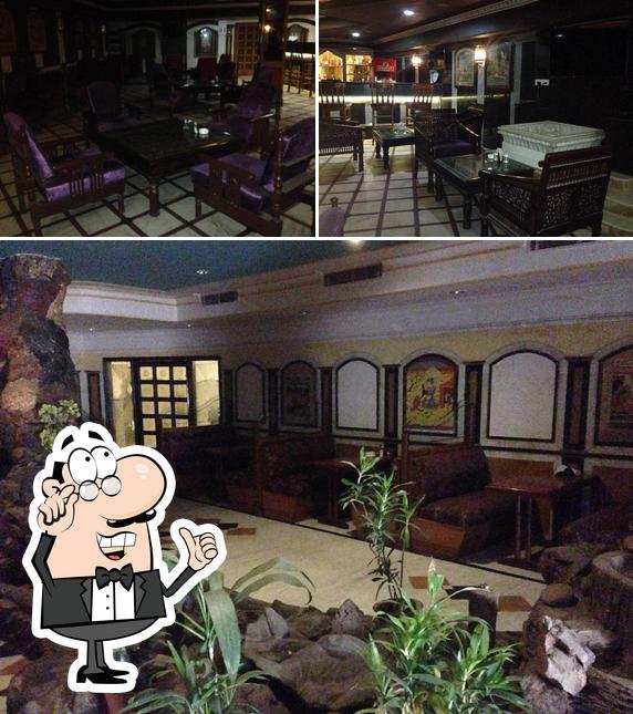 Take a seat at one of the tables at SAQI BAR