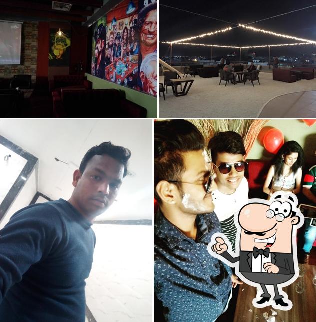 Take a seat at one of the tables at Vapor Cafe & Lounge