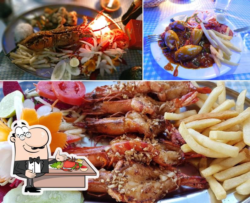 Order different seafood meals served at Baggies Beach Shack