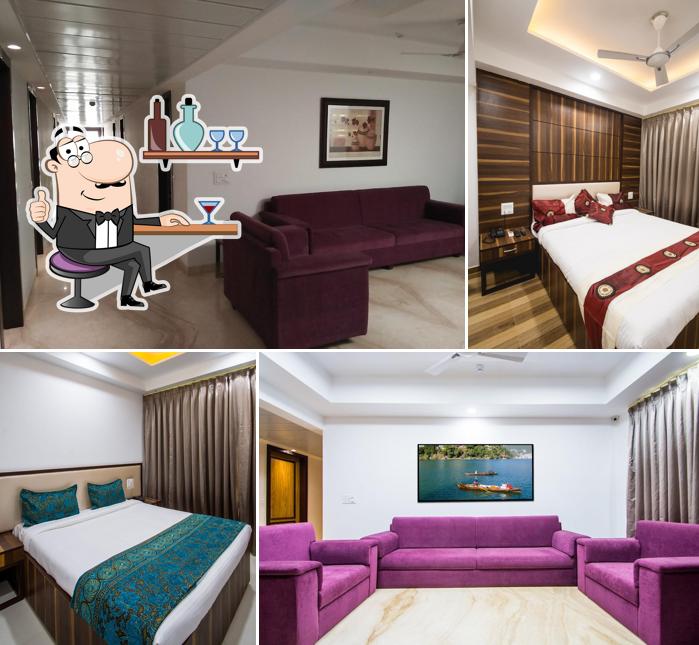 Take a seat at one of the tables at Sapphire Inn Hotel & Banquets Jaipur Mansarovar