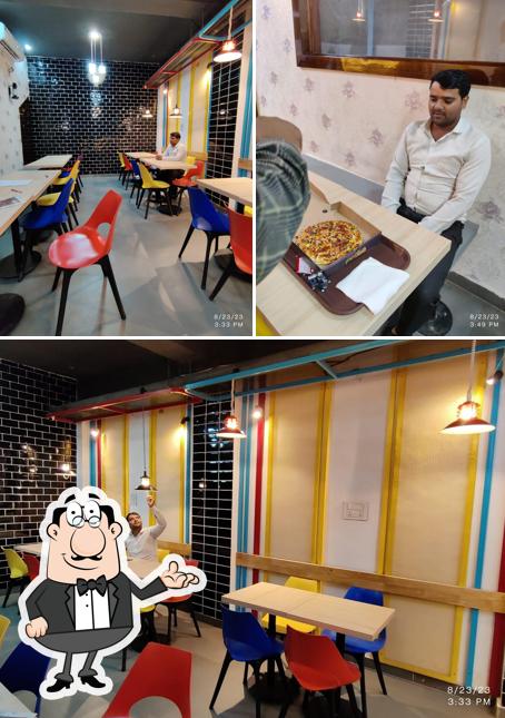 Take a seat at one of the tables at All Dine