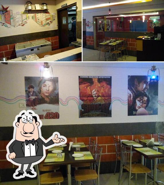 Take a seat at one of the tables at Dhaba's