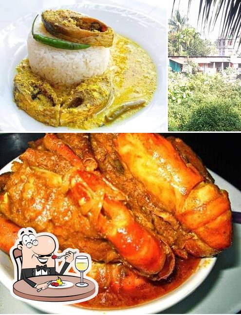 Check out the image displaying food and exterior at Bondhu Hotel