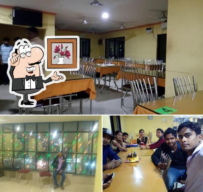 Take a seat at one of the tables at Jajpur Restaurant