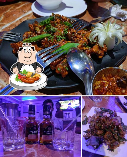 The photo of food and bar counter at Lalit Bar And Restaurant