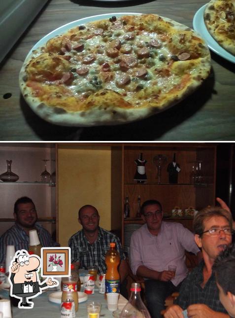 Dai un'occhiata agli interni di Ristorante-Pizzeria Lu Saligiu