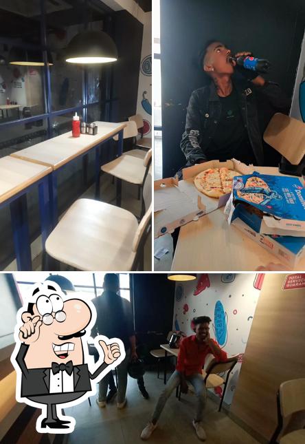 Take a seat at one of the tables at Domino's Pizza Chandra Vihar Colony, Dhanbad Take a seat at one of the tables at Domino's Pizza Chandra Vihar Colony, Dhanbad