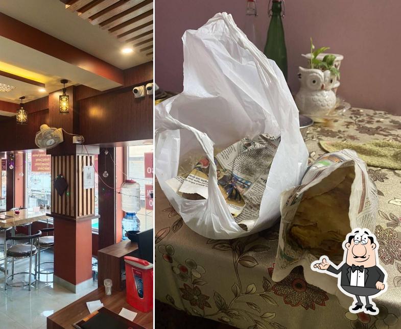 Take a seat at one of the tables at Sagarika hotel and restaurant