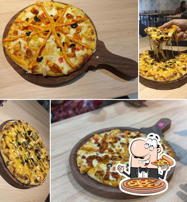 Try out pizza at Cream Station ക്രീം സ്റ്റേഷൻ