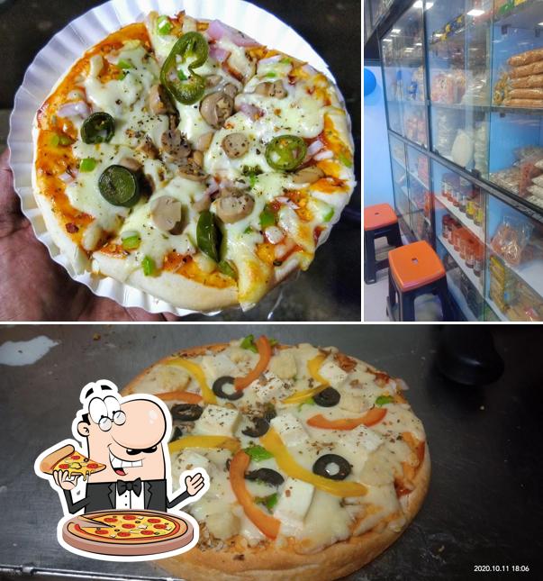 Pick pizza at BAKE N BITES CAFE N RESTAURANT