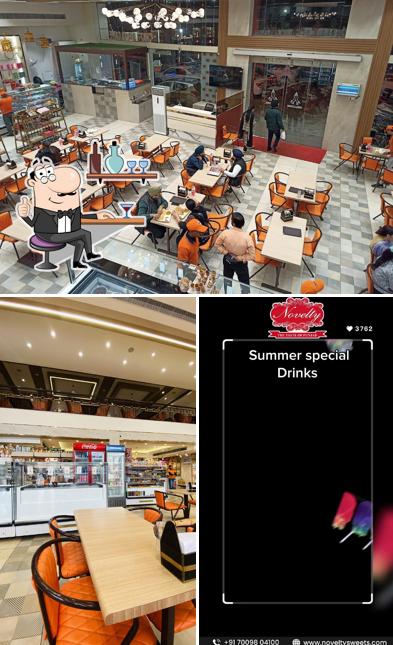 Take a seat at one of the tables at Novelty Sweets & Restaurant