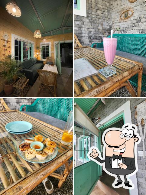 Take a seat at one of the tables at Purkul Cafe