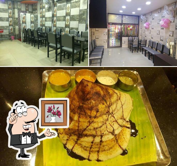 The photo of Kai Pakkavam Veg Restaurant’s interior and food