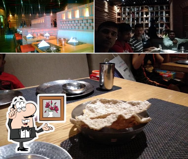Take a seat at one of the tables at Wah! Marathi
