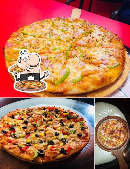 Get pizza at Cafe Pb 9teen