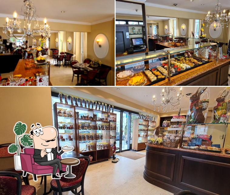 Gli interni di Café-Confiserie Surchat