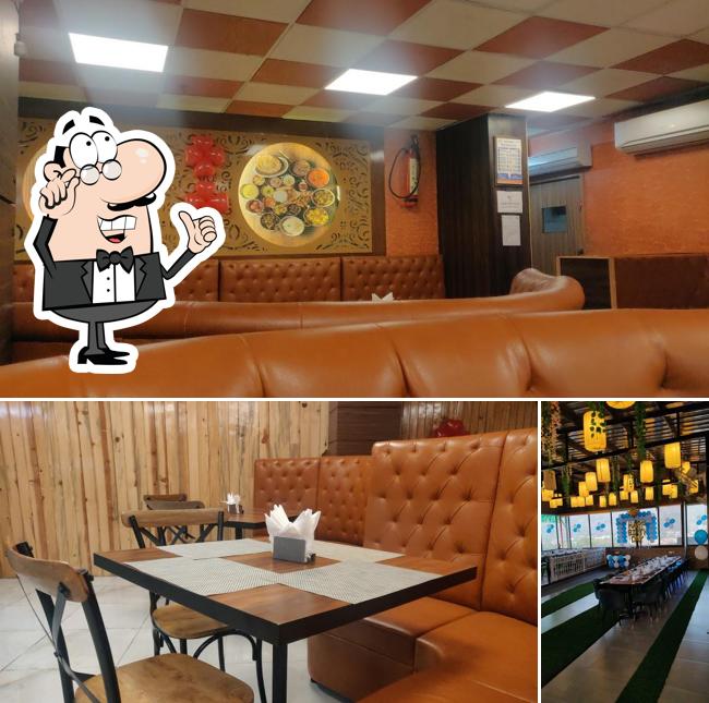 Take a seat at one of the tables at Baithak bhoj