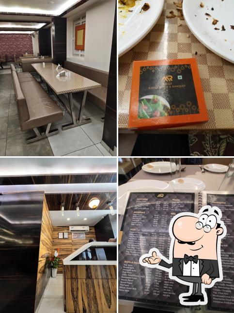 Take a seat at one of the tables at Mild Restaurant