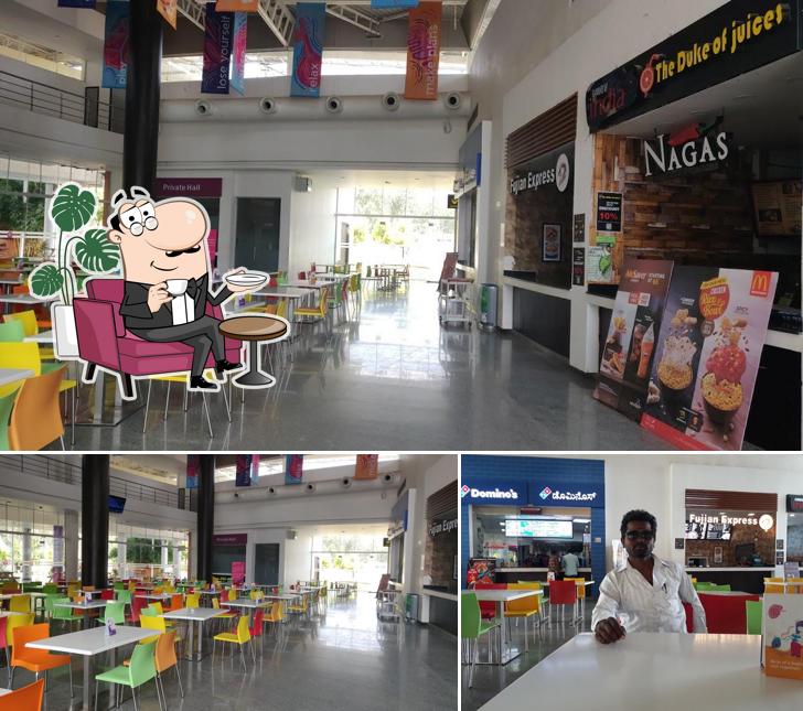 Check out how Domino's Pizza Highway star Mall, Venkatapura looks inside
